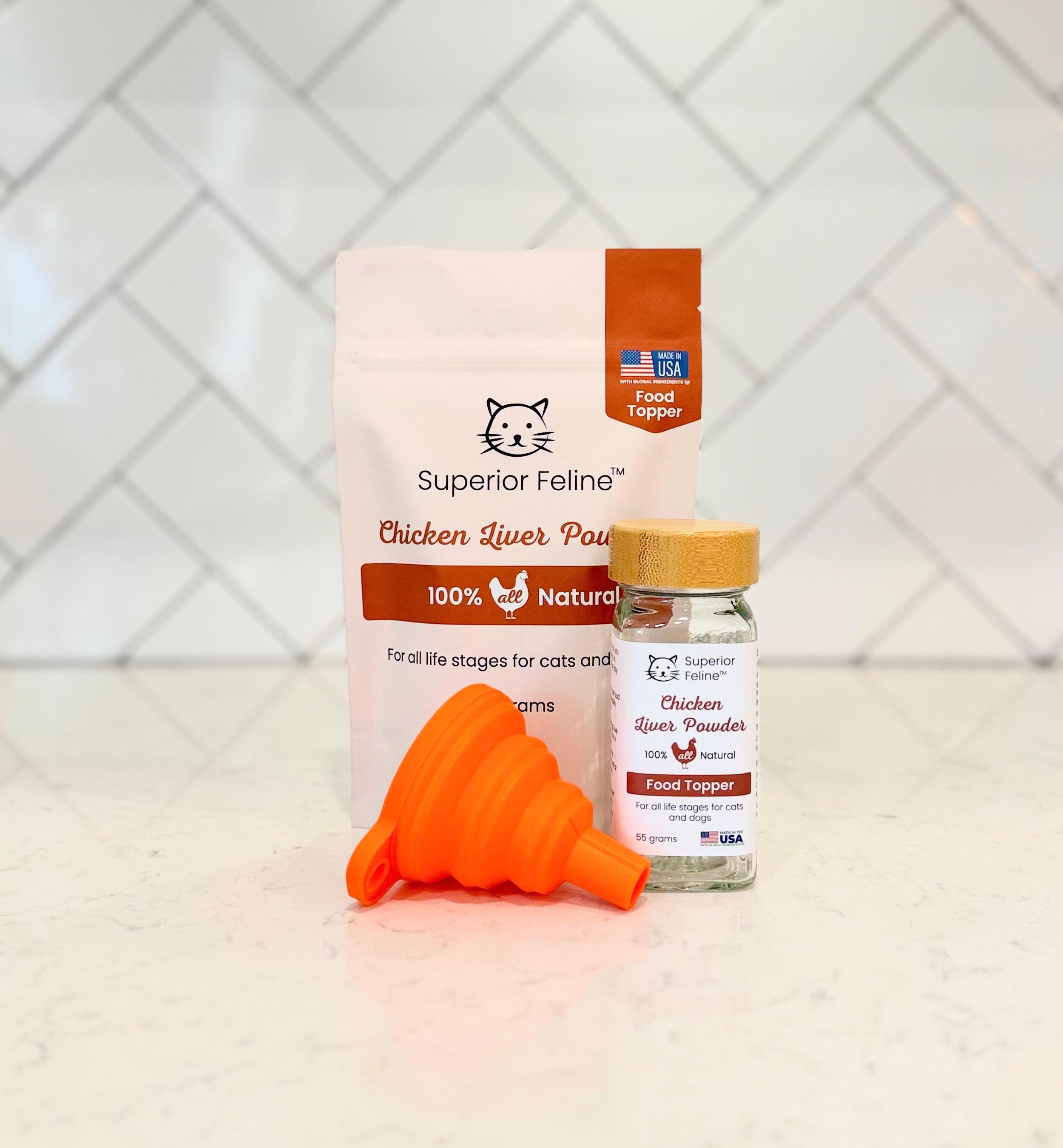 Superior Feline Chicken Liver Powder packaging with a shaker jar and easy-fill funnel on a tiled background