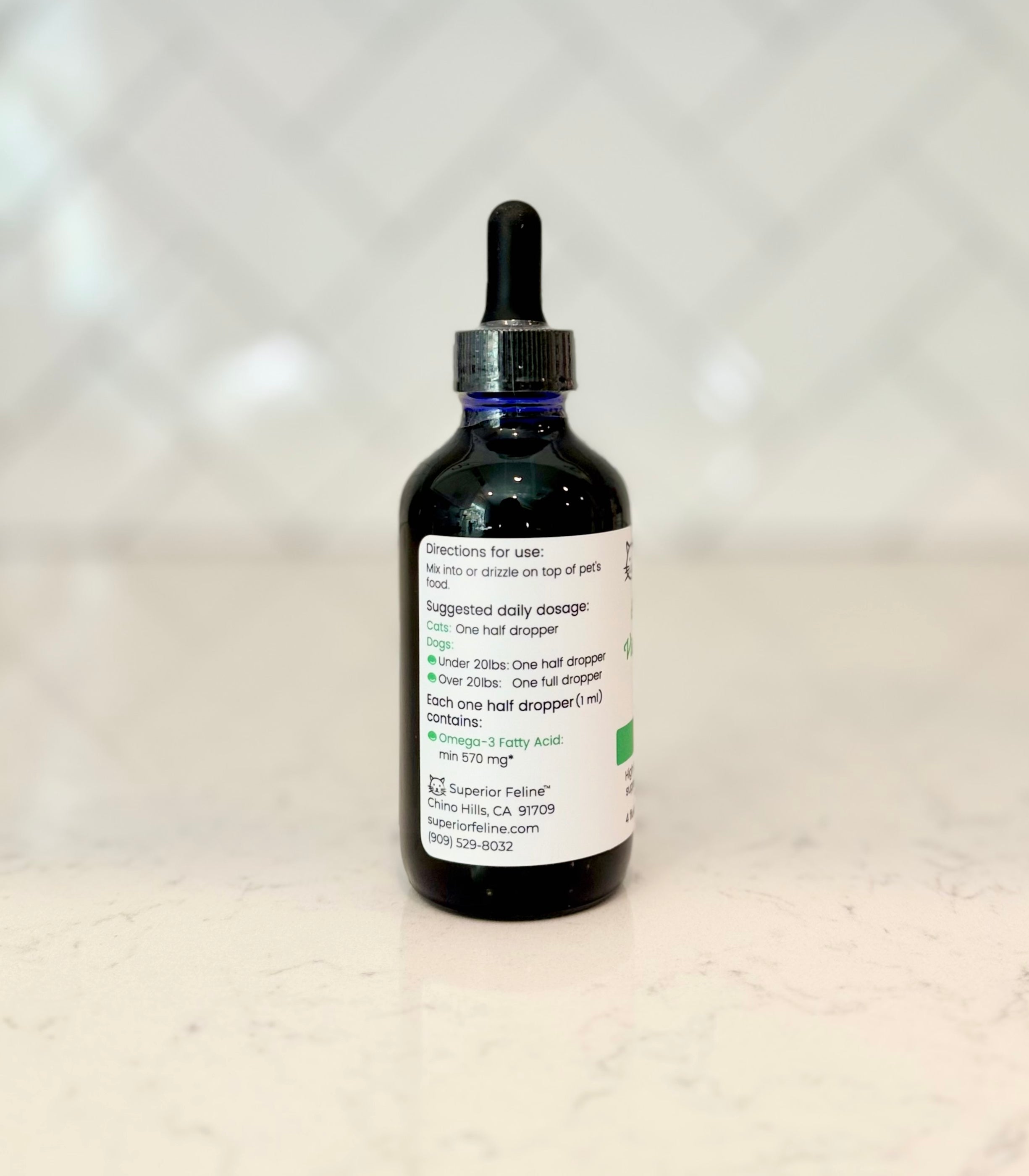Side view of Superior Feline Chia Seed Oil bottle with label containing info about directions for use