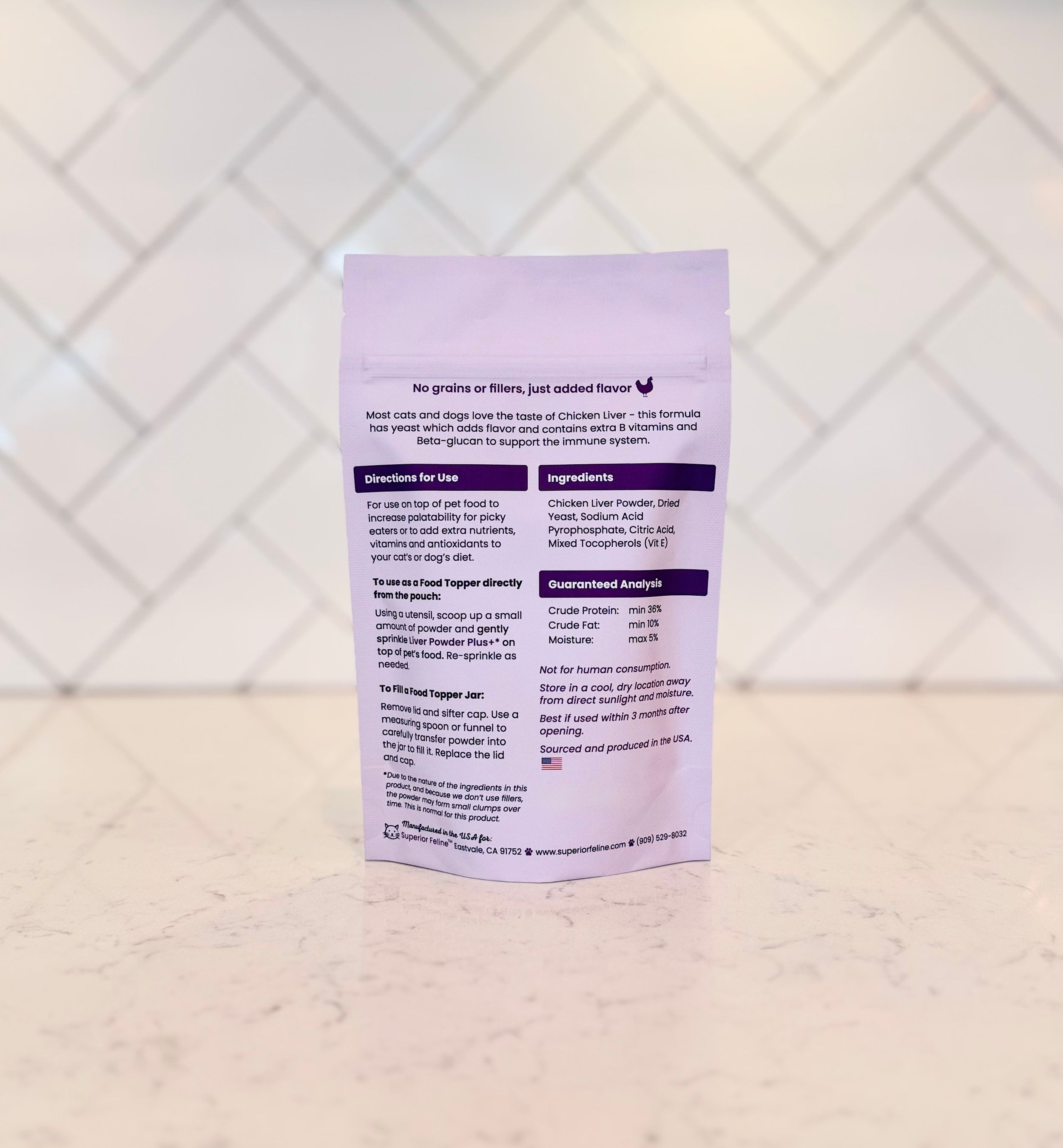 Superior Feline Liver Powder Plus pet food topper packaging with text explaining directions and ingredients
