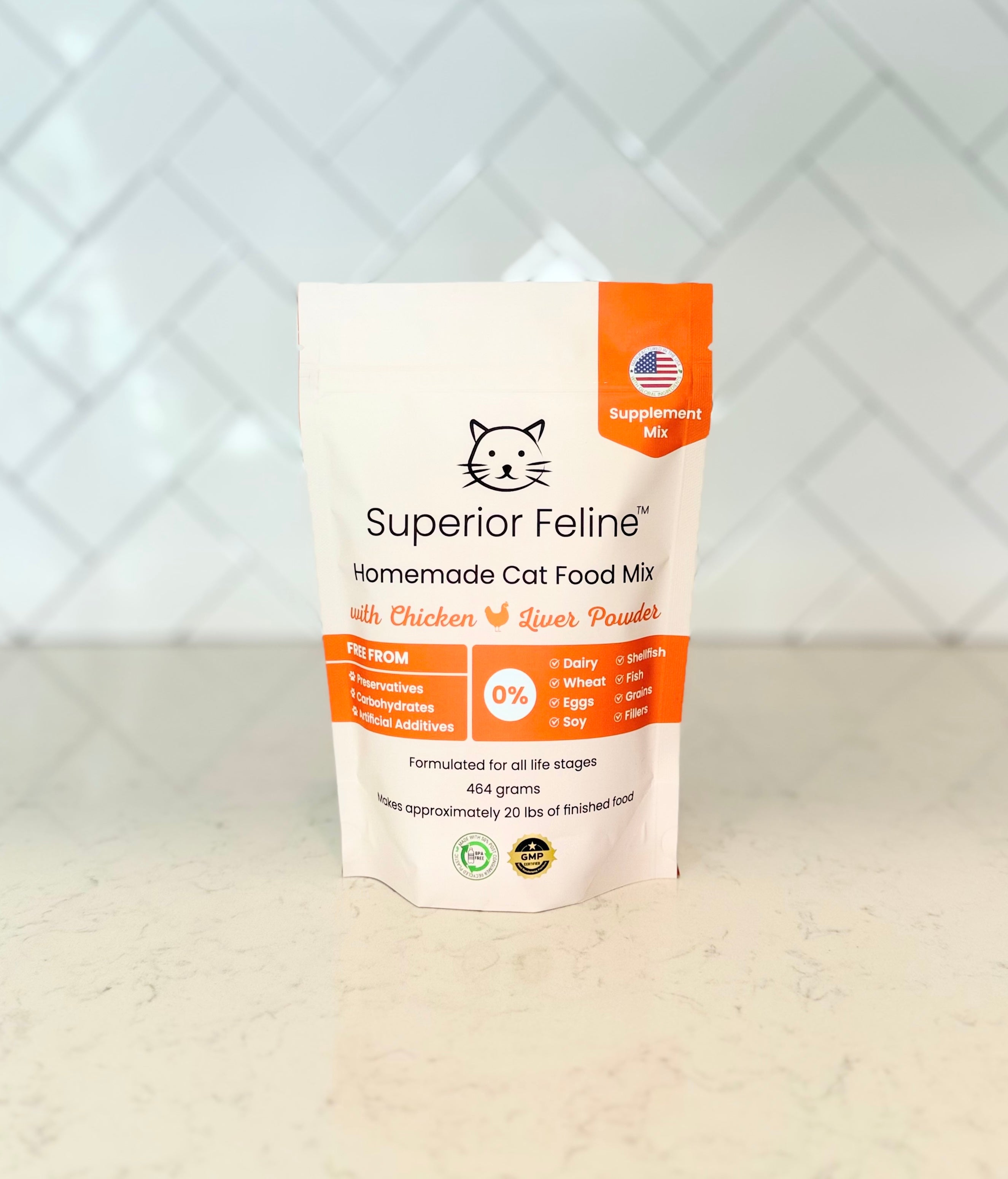 Front view of Superior Feline Original Formula Homemade Cat Food Supplement Mix package on a kitchen countertop with tiled backsplash.