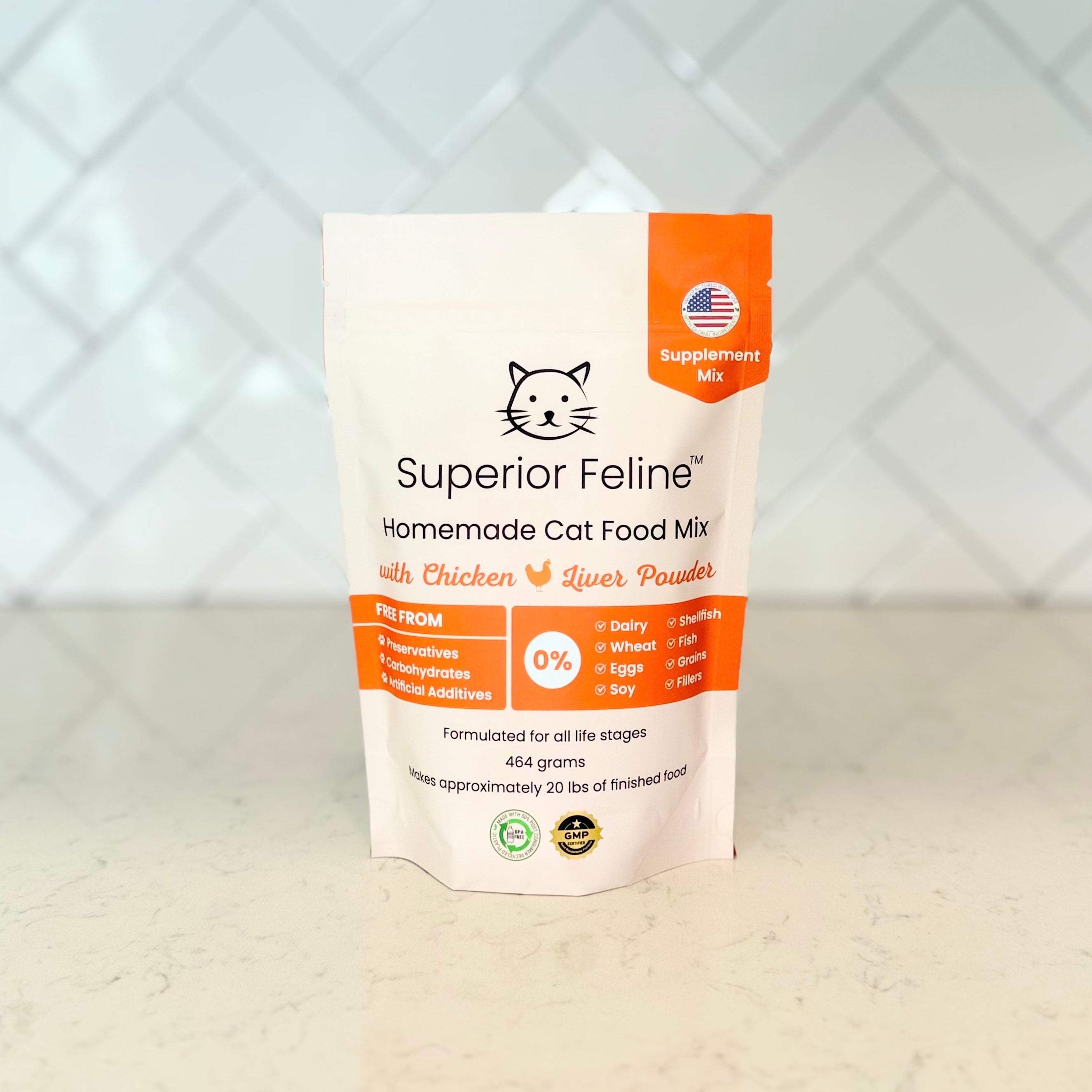 Superior Feline Homemade Cat Food Mix packaging on a light surface with a white geometric patterned background