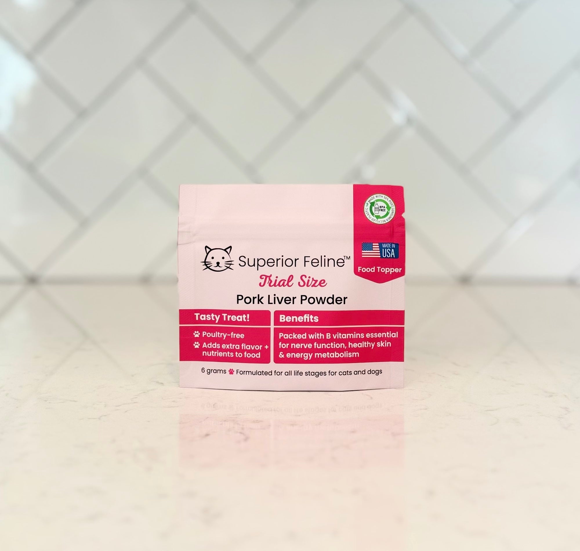 Front View of Superior Feline Trial Size Pork Liver Powder packet on a counter top