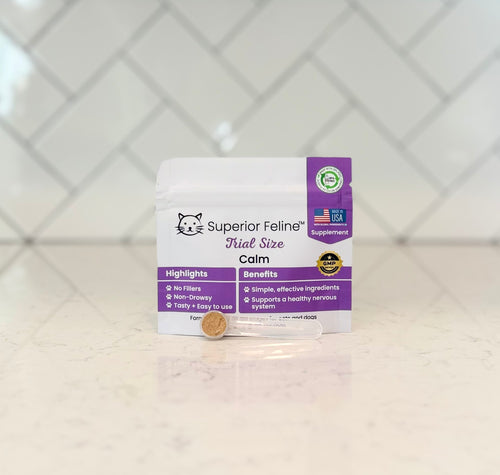 Superior Feline cat supplement package on a white surface with a geometric patterned background