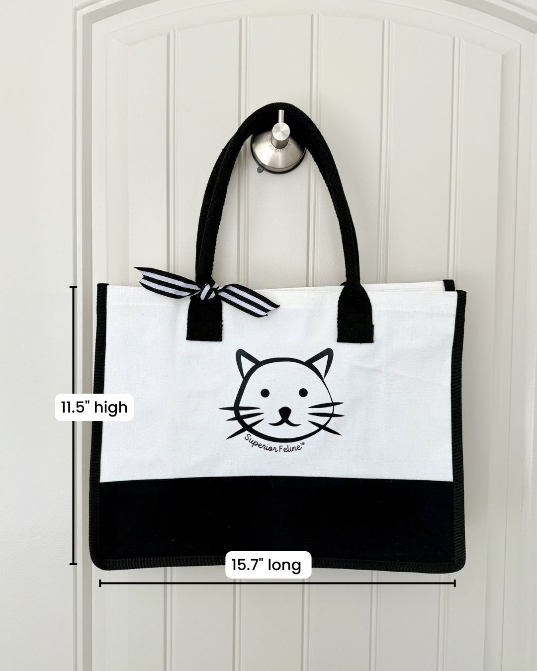 Front of Superior Feline tote bag exterior showing dimensions of 11.5" high and 15.7" long.