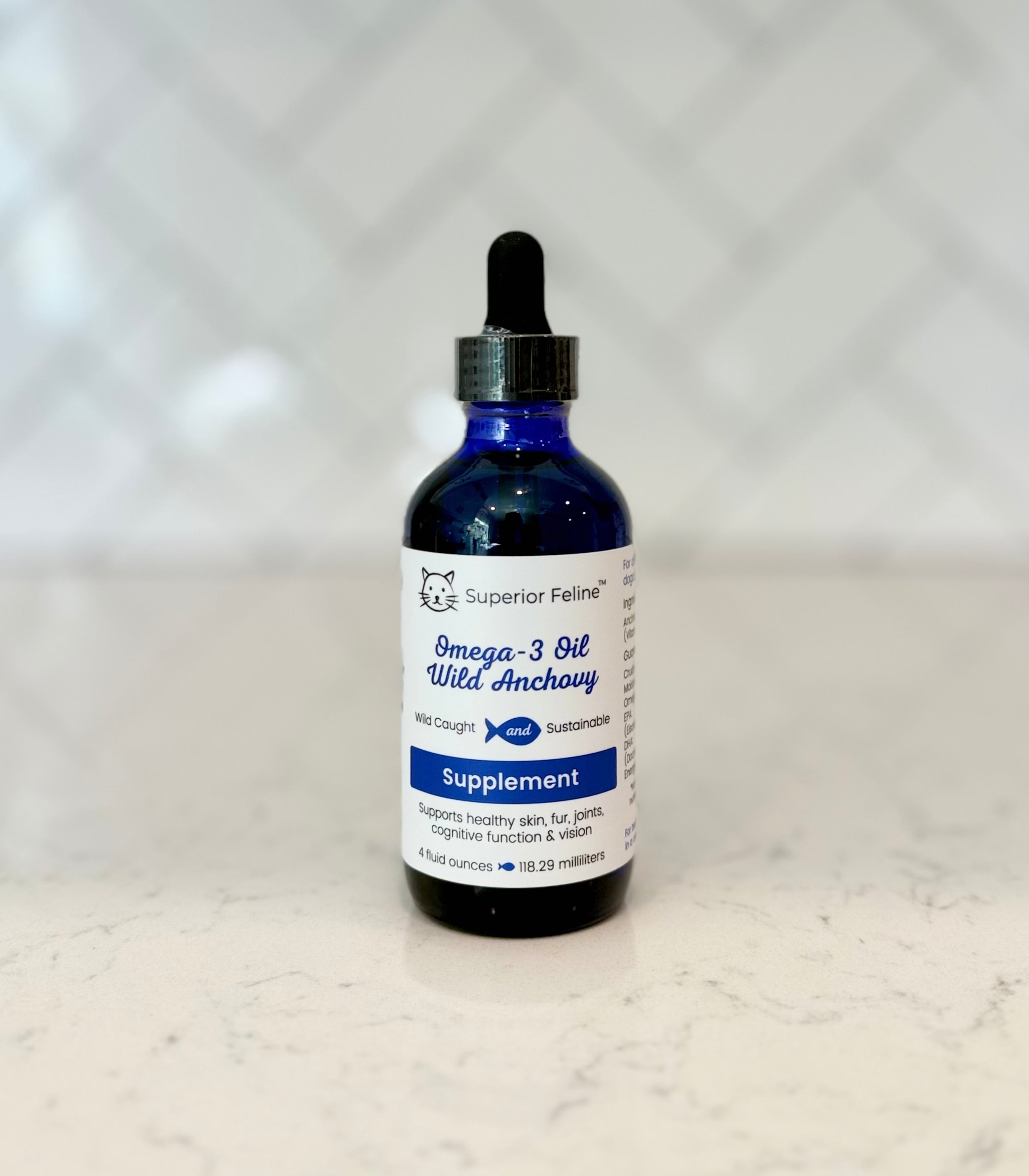 Front view of Superior Feline Wild Anchovy Oil bottle with label 